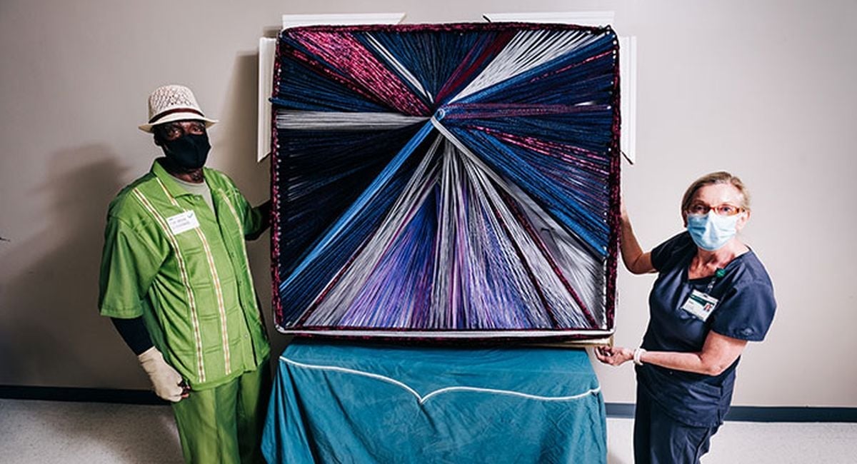 Alabama artist who nearly died creates art for the people who saved him